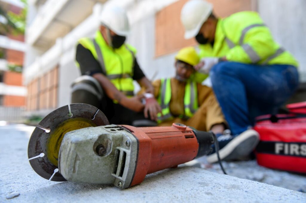 Hand of builder worker injury bleeding, accident in work, Using