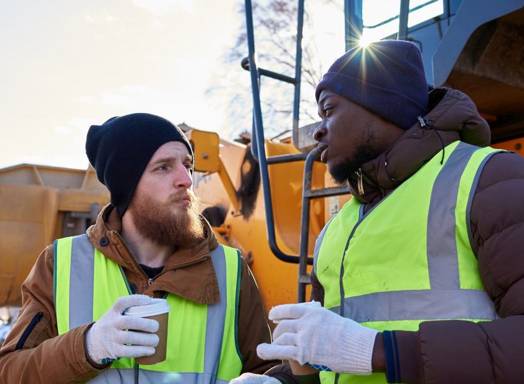 Two Coworkers Enjoying a Break in Cold Working in the Cold tips Social