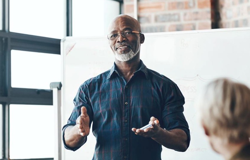 senior business man speaks about training record management systems