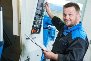 Safety Professional operating machine in metal industry